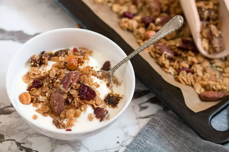 What makes granola a healthy breakfast or snack option?