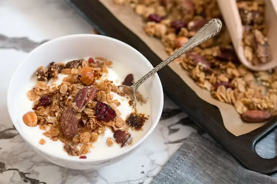 What makes granola a healthy breakfast or snack option?